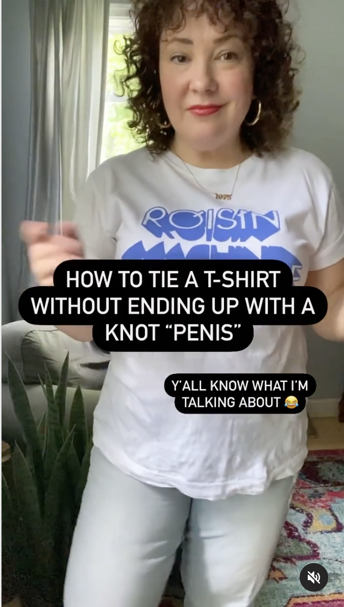 video of a woman tying the edge of a t-shirt