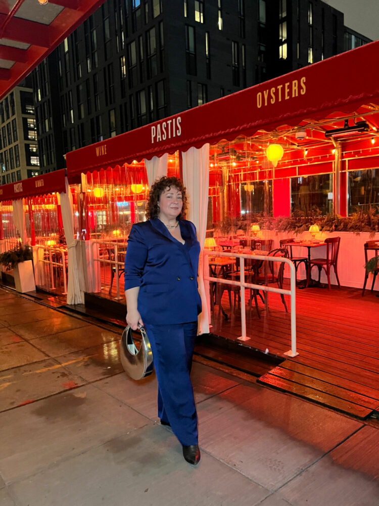 Charles Perri of Wardrobe Oxygen walking past the outdoor seating of Pastis DC in the Union Market District.