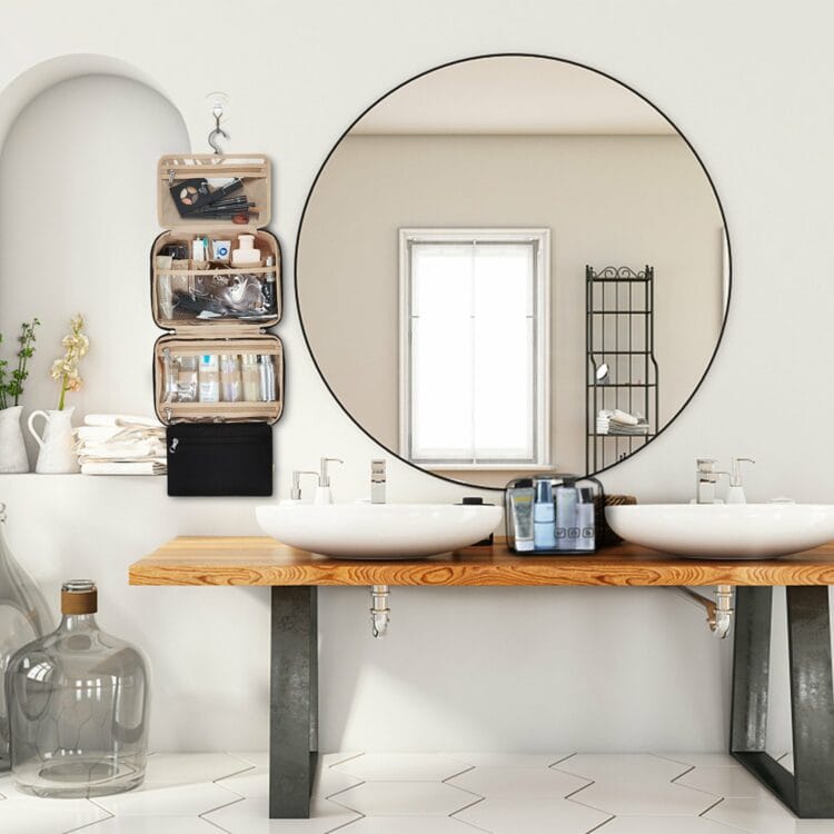 bathroom vanity with mirror; to the side of the mirror on the hook is the BAGSMART toiletries bag