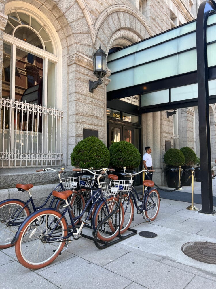 The outside of the Hotel Riggs Washington DC featuring the bicycles the hotel provides free to their guests