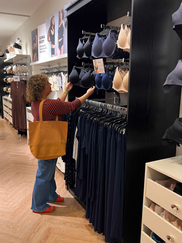 Charles Perri of Wardrobe Oxygen perusing bras at the Soma boutique in Westfield Montgomery Mall in Maryland