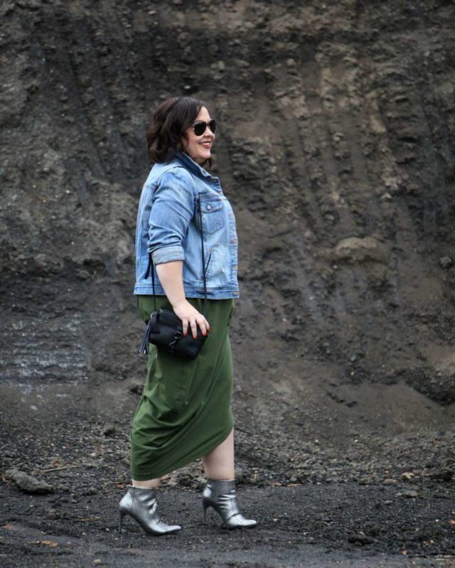 Wardrobe Oxygen, over 40 fashion blogger in a Universal Standard Geneva dress with a J. Crew Factory denim jacket and silver snakeskin booties